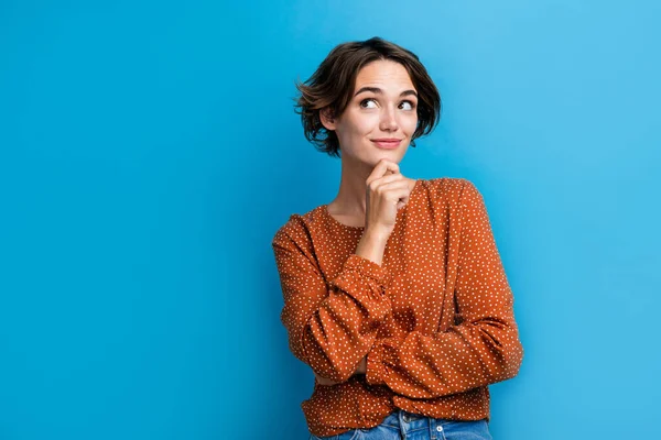 stock image Portrait of attractive interested lady experienced manager touching her chin looking mockup isolated blue color background.