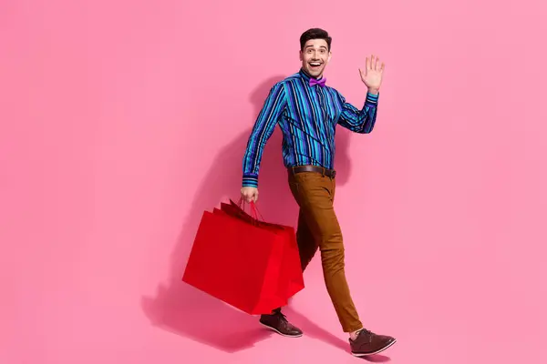 Full Length Photo Charismatic Funny Guy Steps Red Gift Packages — Stock Photo, Image