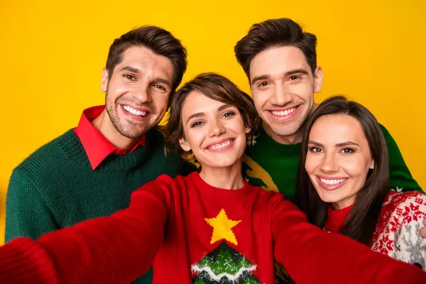 Photo of positive best buddies lady guy celebrate x mas make selfie isolated over bright color background.