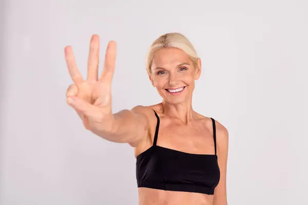 Photo Lovely Friendly Sporty Person Beaming Smile Arm Fingers Demonstrate — Stock Photo, Image