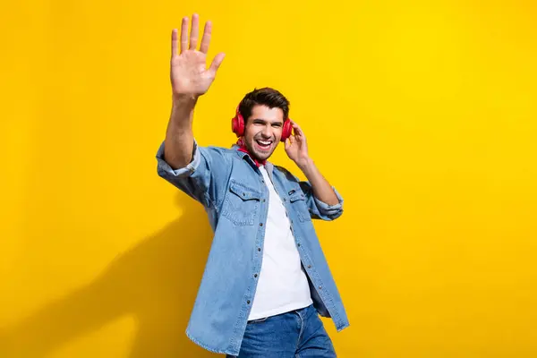 Photo Portrait Nice Young Man Have Fun Touch Headphones Wave — Stock Photo, Image