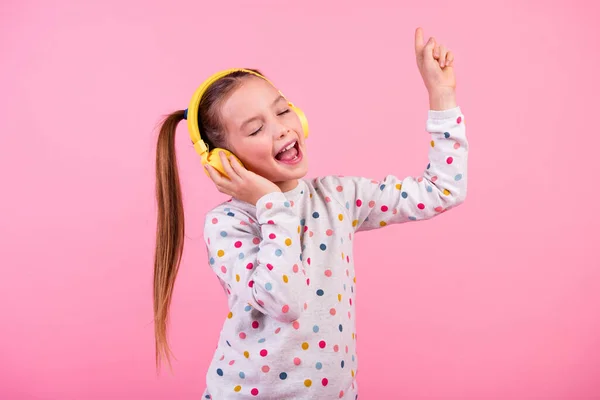 Photo Nice Small Girl Wear Stylish Sweatshirt Touch Headphones Raising — Stock Photo, Image