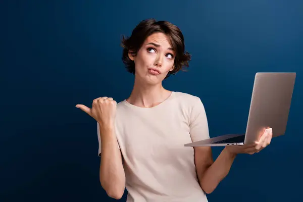 Photo Lovely Lady Hold Netbook Point Look Skeptical Empty Space — Stock Photo, Image