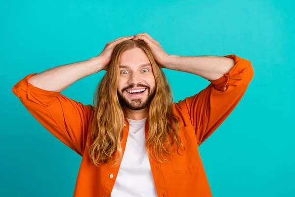 Portrait photo of young amazed man hippie shocked when see all his friends prepared surprise for birthday isolated on cyan color background.
