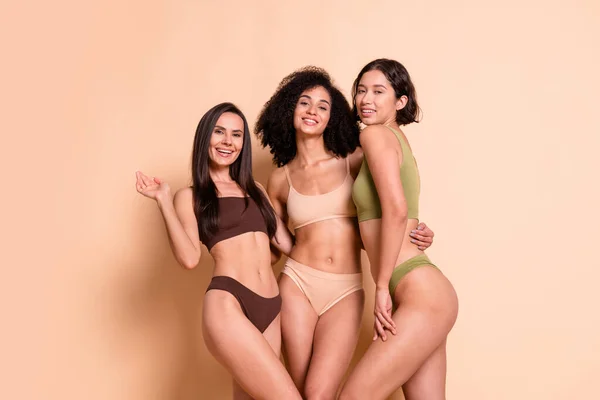 No filter studio photo of cute girlish women wear lingerie hugging enjoy body positive isolated pastel color background.