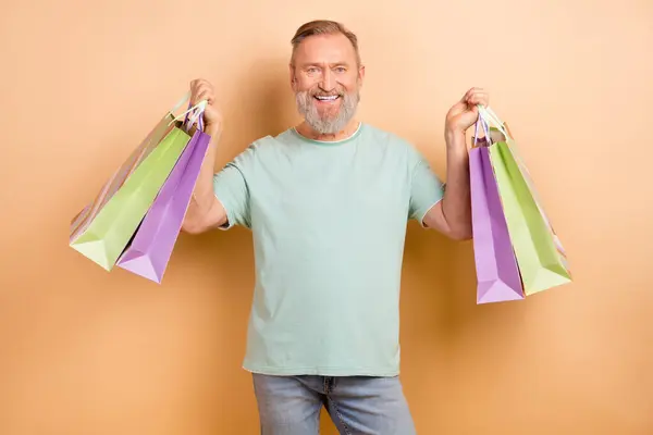 Photo Cheerful Glad Man Hold Packages Summer Seasonal Price Isolated — Stock Photo, Image