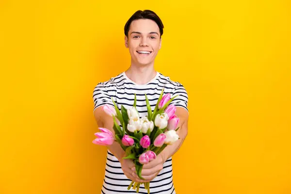 Photo Positive Student Dressed Striped Shirt Presenting You Bouquet Flowers — Stock Photo, Image