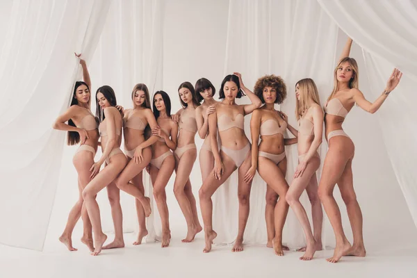 No retouch photo of stunning different body sexual shape models advertising underwear for magazine edition.