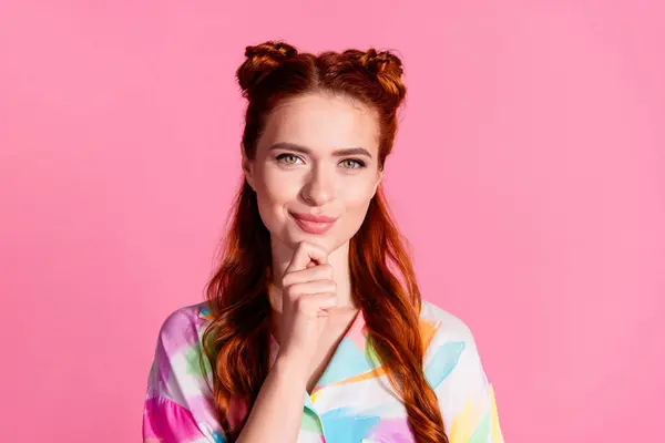 Portrait of minded intelligent woman with foxy hairstyle wear print shirt hold finger on chin thinking isolated on pink color background.
