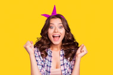 Portrait of nice crazy fan cheerful cheery glad lovely attractive adorable sweet lady opened mouth holding fists having fun isolated over violet pastel background. clipart