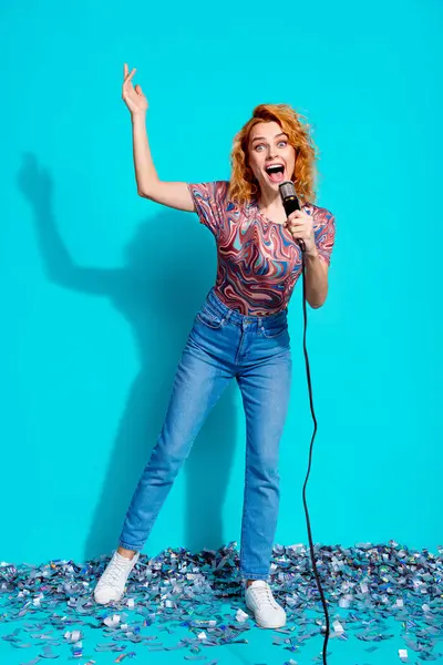 stock image Full length vertical portrait of nice lady enjoy singing wear t-shirt isolated on teal color background.