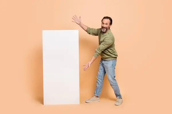 Full Body Portrait Crazy Cheerful Man Arms Demonstrate Empty Space — Stockfoto