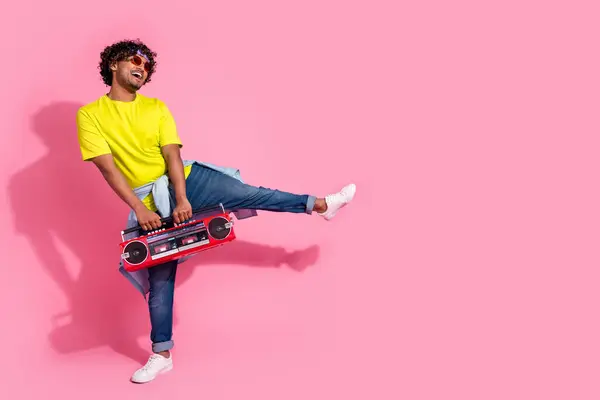 stock image Photo of funny nice man wear stylish clothes music dance break dance look empty space isolated on pink color background.