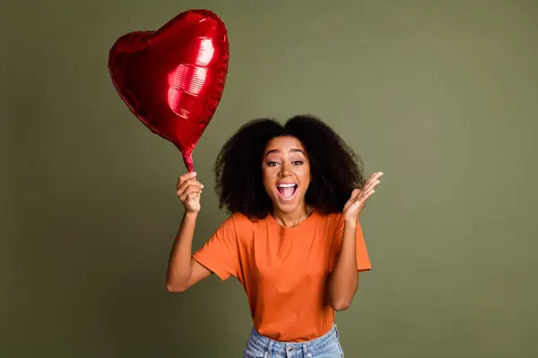 Photo Excited Attractive Lady Dressed Orange Outfit Rising Heart Balloon Stock Image