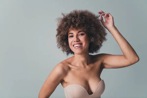 stock image Unretouched photo of smiling girl touch hair curl enjoy beauty salon result isolated over pastel color background.