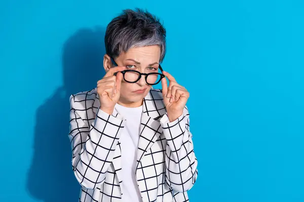 stock image Photo of minded suspicious woman wear trendy stylish clothes hmm decision isolated on blue color background.