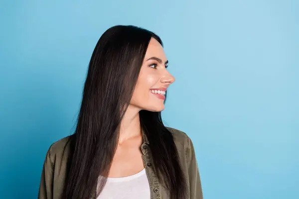 stock image Photo of charming positive woman wear khaki short smiling looking empty space isolated blue color background.