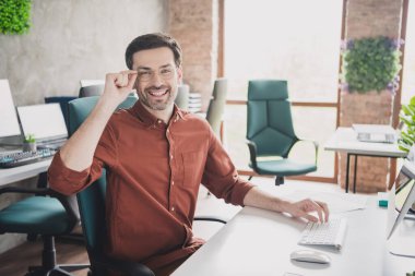 Photo of handsome man professional sit tables coworking successful businessman wear brown formalwear nice creative light office. clipart