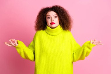 Photo portrait of pretty young girl shrug shoulders confused wear trendy yellow outfit isolated on pink color background. clipart