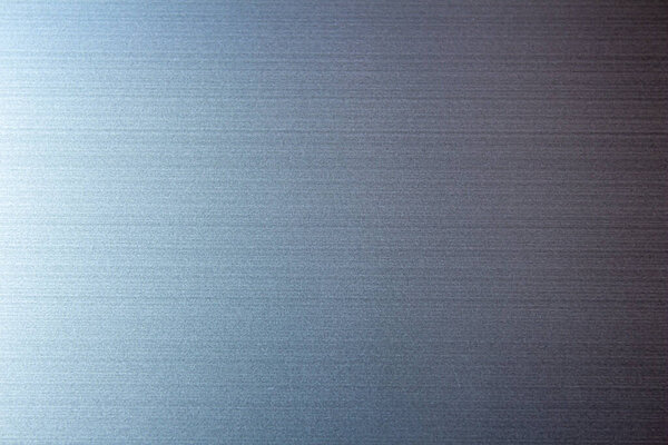 Gray metal texture background. Shiny grey surface for designs.