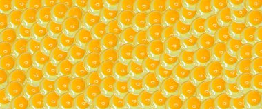 Yumurta sarısı desenli arka plan. Çiğ yumurta sarılarının üst görüntüsü. Web afişi veya reklam için yüksek kaliteli fotoğraf.