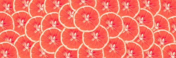 Orange fruit slices. Top view of orange slices pattern texture background.