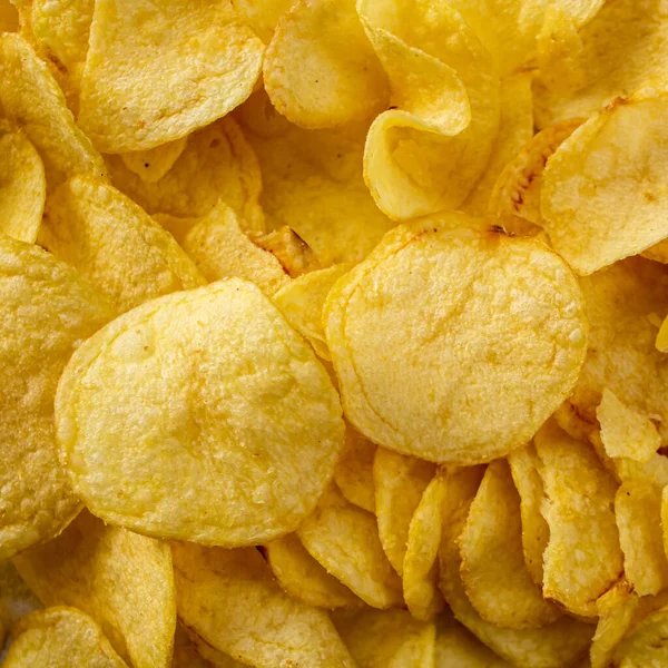 Chipsy Ziemniaczane Widok Chrupiące Chipsy Tło Żywnościowe Niezdrowe Tłuste Słone — Zdjęcie stockowe