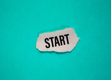 Kağıt parçasına 'Başlangıç' sözcüğü.