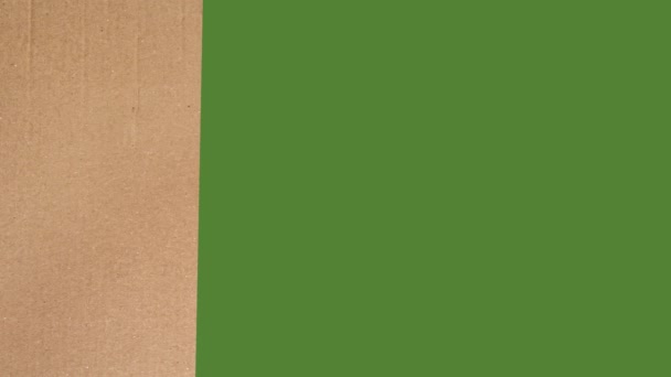 Cardboard Pieces Green Screen Chroma Key Background Copy Space — Vídeo de stock