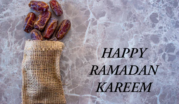 Happy Ramadan Kareem. Date fruits. Ramadan background photo with copy space. Holy month for Muslims. Top view.