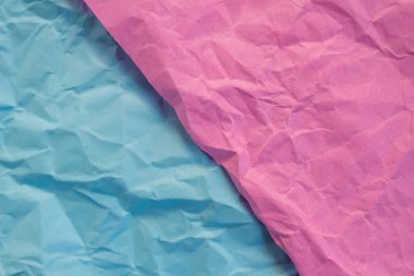 Crumpled blue and pink paper texture background. High quality photo