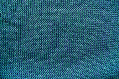 Soyut yeşil kumaş dokusu arkaplanı.