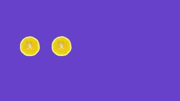 Stop Motion Animation Lemon Slices Purple Background Healthy Citrus Concept — Stockvideo
