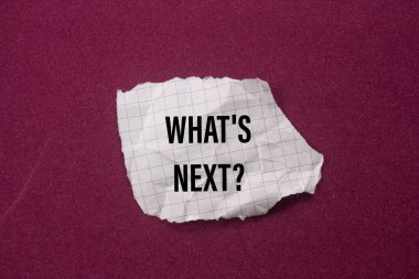 What's Next? question written on torn paper.