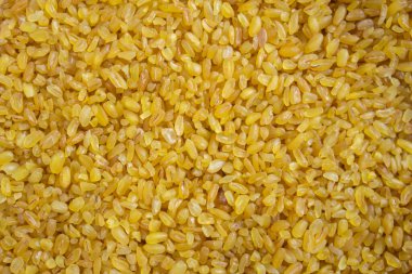 Bulgur wheat texture background photo
