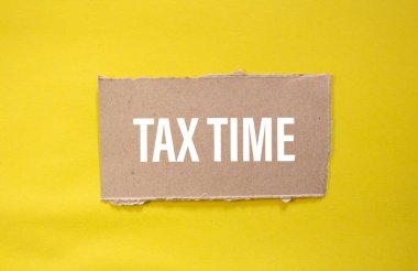 Tax Time! word written on paper. Business concept photo.