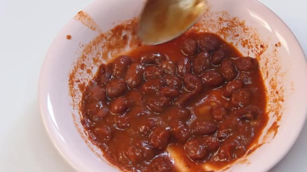Someone Takes Spoonful Pinto Beans Plate Kidney Bean Dish Plate — Video Stock