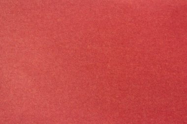 Maroon paper texture background. Blank paper surface for designs.