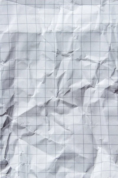Crumpled graph paper texture background