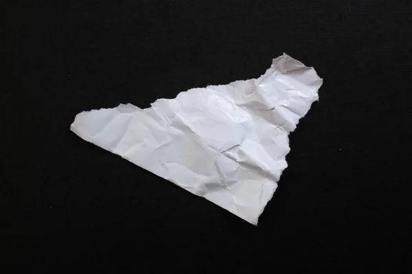 White Torn Paper Piece Isolated Black Background — стоковое фото