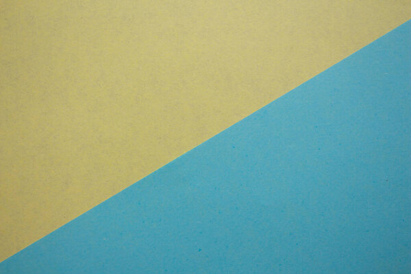 Yellow and blue paper texture background. Blank paper surface for designs.