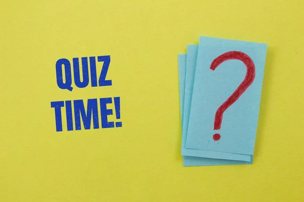 Quiz time concept. Question mark on a yellow background. Survey or exam background photo.