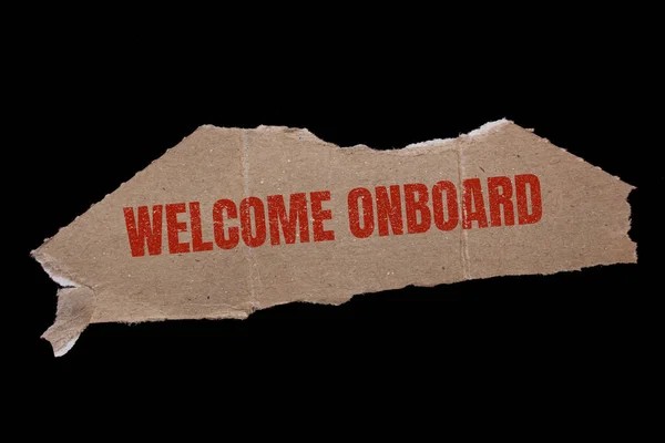 Welcome onboard written on torn paper. Business concept background.