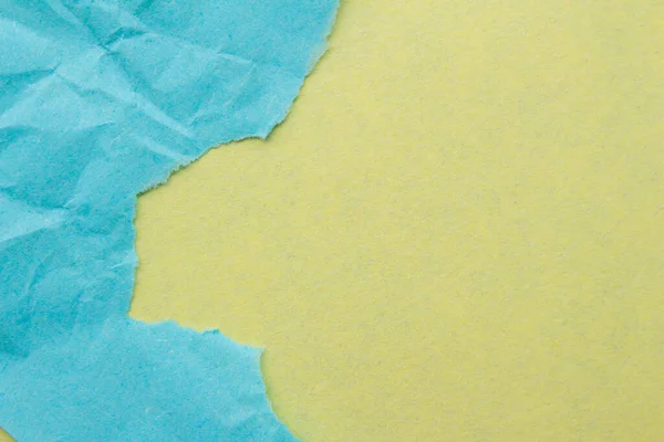 Голубая Бумага Жёлтом Фоне Рваная Текстура Края Бумаги — стоковое фото