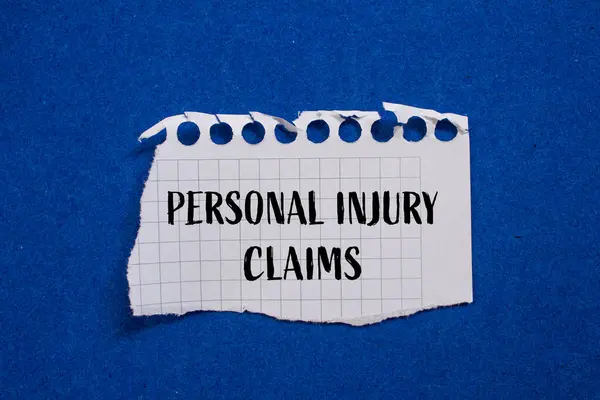 Personal Injury Claims Written Ripped White Paper Blue — Stock Photo, Image
