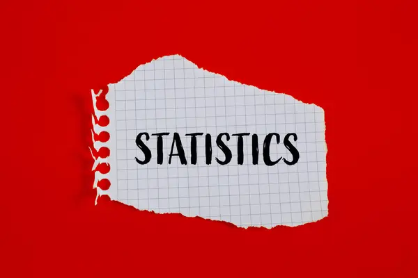 Statistieken Woord Geschreven Gescheurd Wit Papier Met Rode Achtergrond Conceptuele Stockfoto