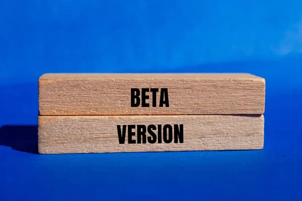 stock image Beta version message written on wooden blocks with blue background. Conceptual beta version symbol. Copy space.