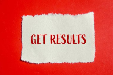 Get results message written on ripped torn paper piece with red background. Conceptual get results symbol. Copy space. clipart