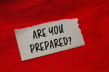 Are you prepared question written on ripped torn paper piece with red background. Conceptual are you prepared question symbol. Copy space. clipart