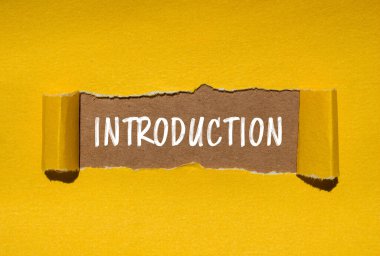 Introduction message written on ripped torn yellow paper with brown background. Conceptual introduction symbol. Copy space. clipart